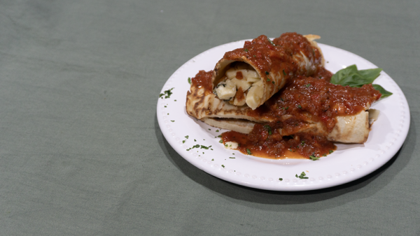 Canelones de ricota y acelga con salsa