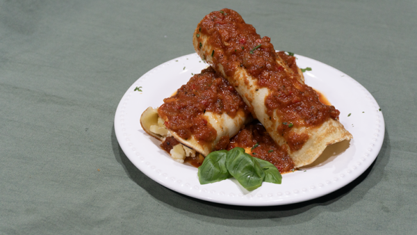 Canelones de calabaza, ricota y muzzarella con salsa fileto