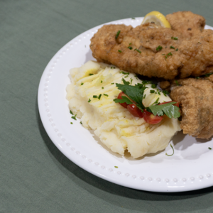 Escalope de pescado con puré de papas