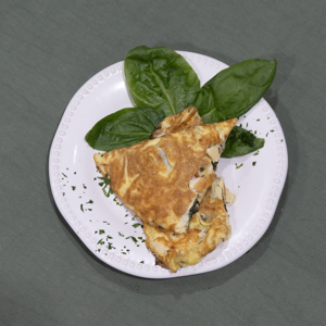 Omelette de espinaca y queso con palta